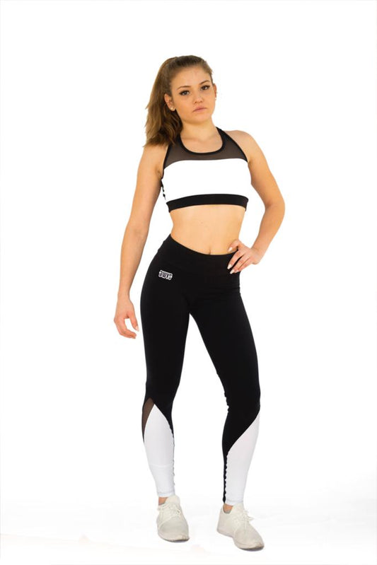 Black & White Leggings mit weißen Bein-Panels und Mesh-Details, Frontansicht am Model