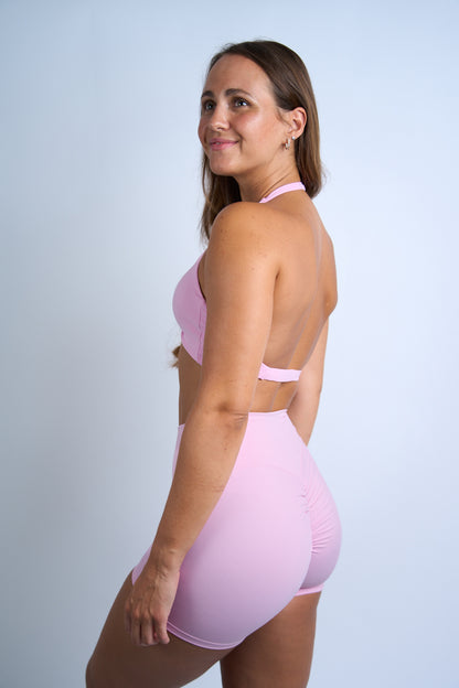pinker Twist Backless Sport-BH von der Seite
